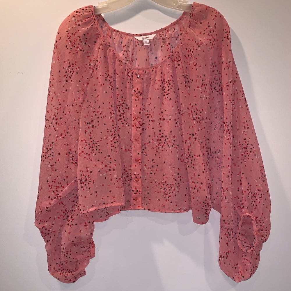 Candie’s pink blouse